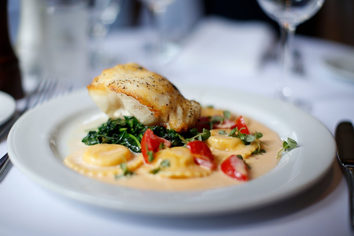 Pan-seared sea bass photographed at Atlantic Fish Company