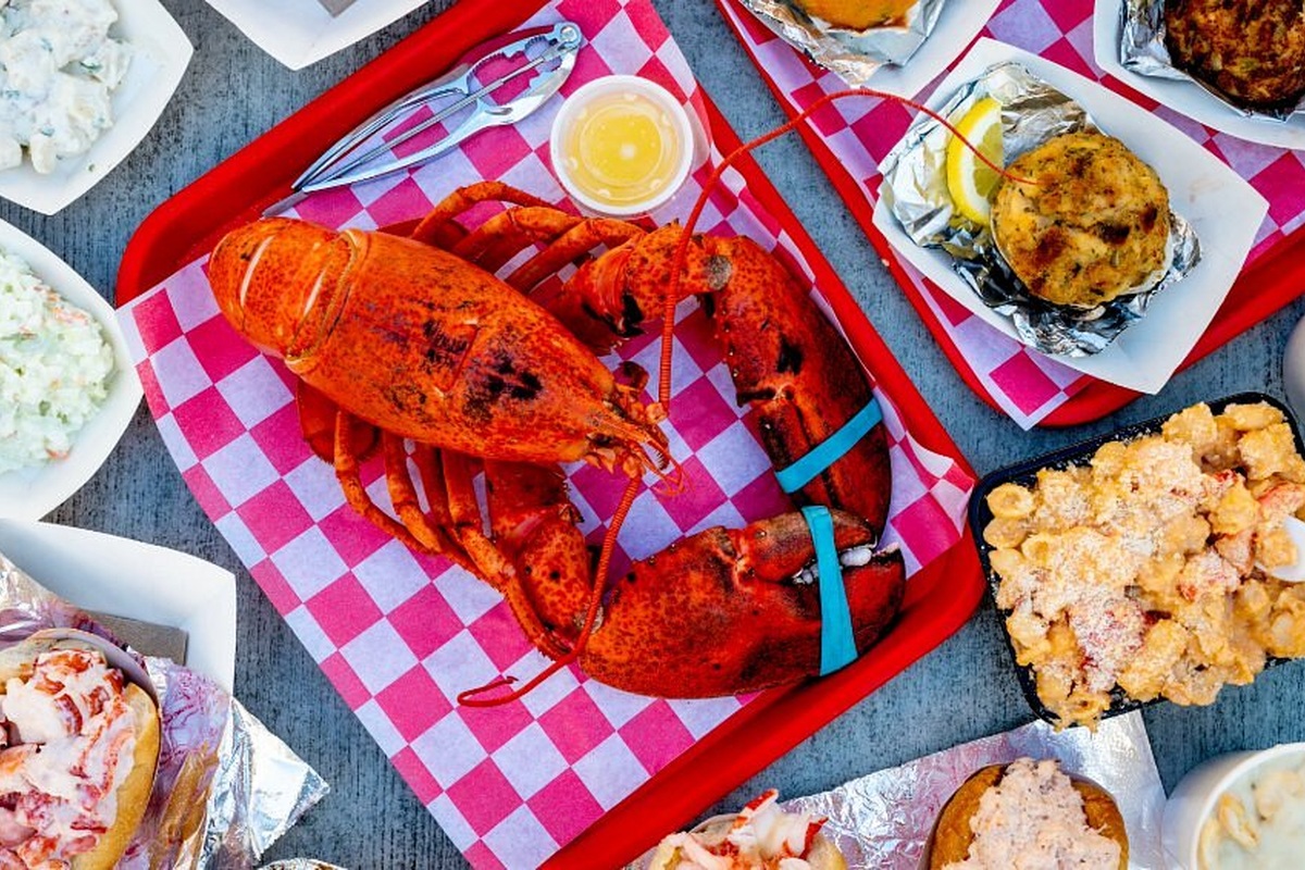 Lobster and a spread of seafood dishes at James Hook & Co. in Boston