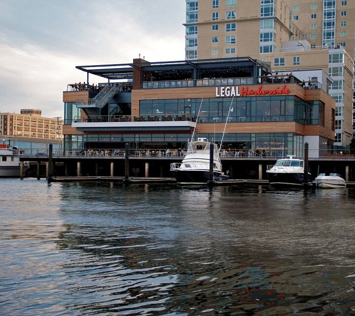 Legal Harborside beside the boats and water at Liberty Wharf
