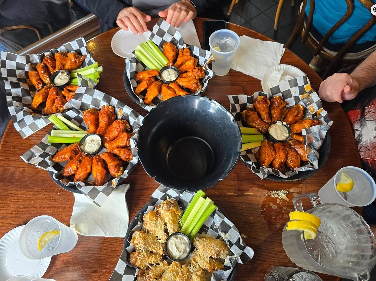 Several baskets of different wing flavors at Bar-Bill Tavern