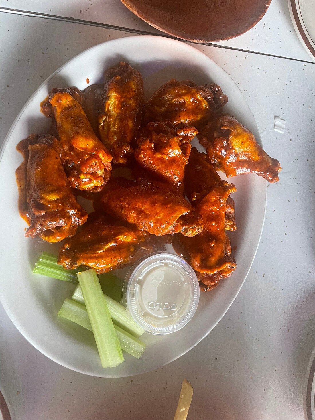 Sauced wings and celery at Kelly’s Korner