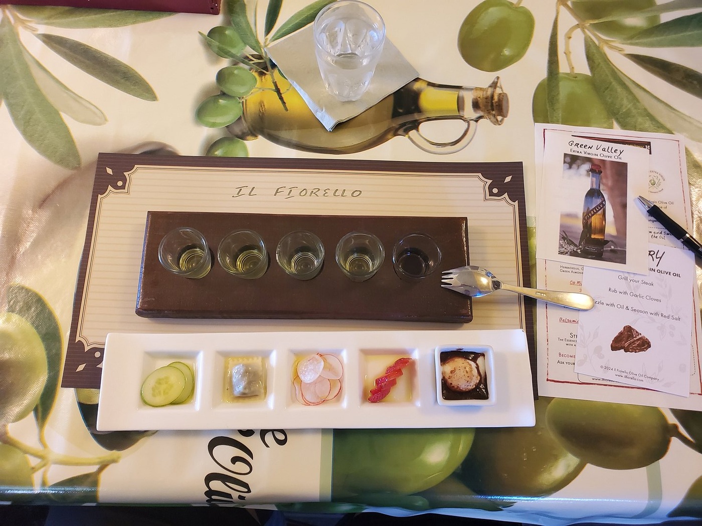 Olive oil tasting cups and small food pairings at IL Fiorello