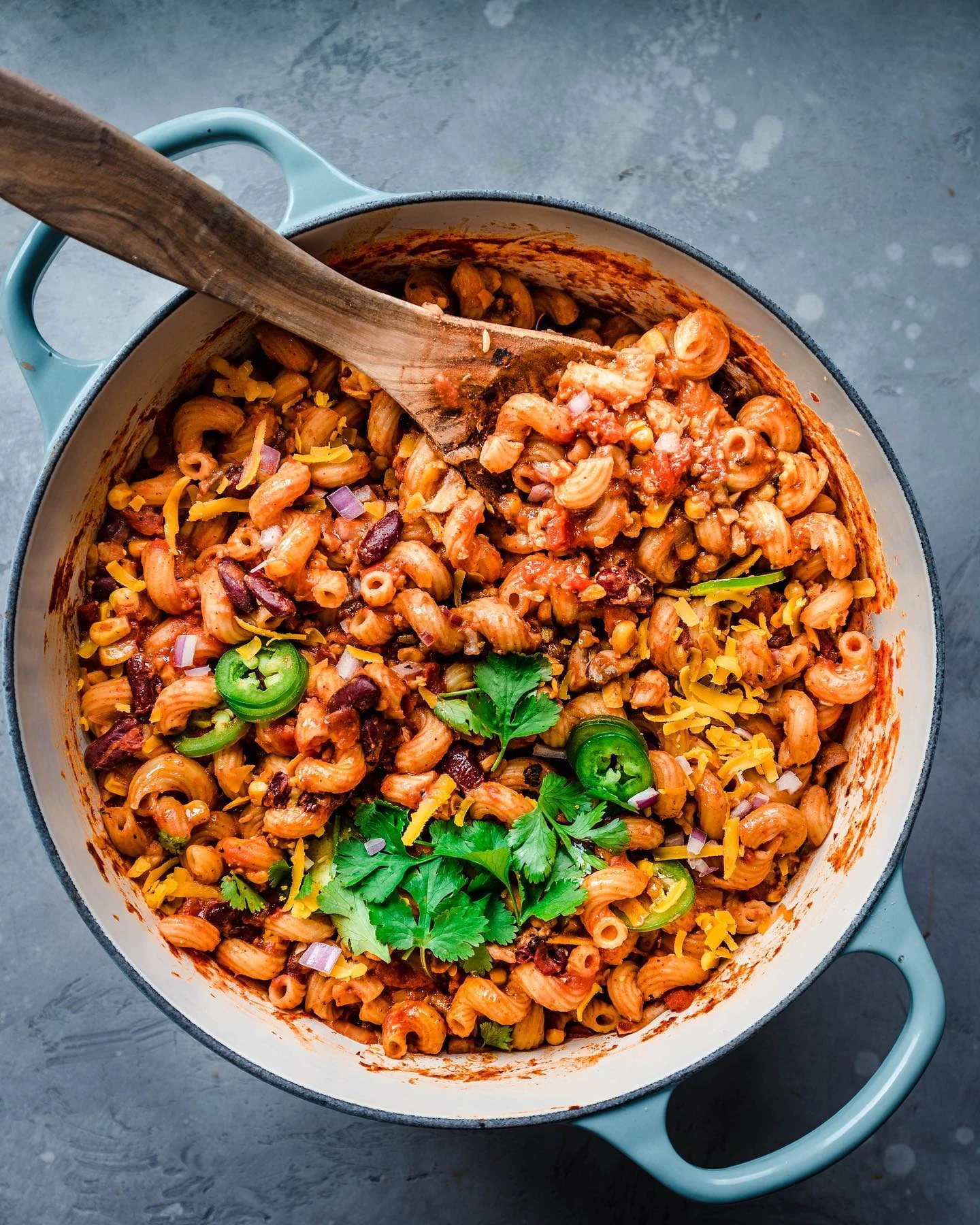 Vegetarian chili mac with beans and elbow pasta in a cooking pot