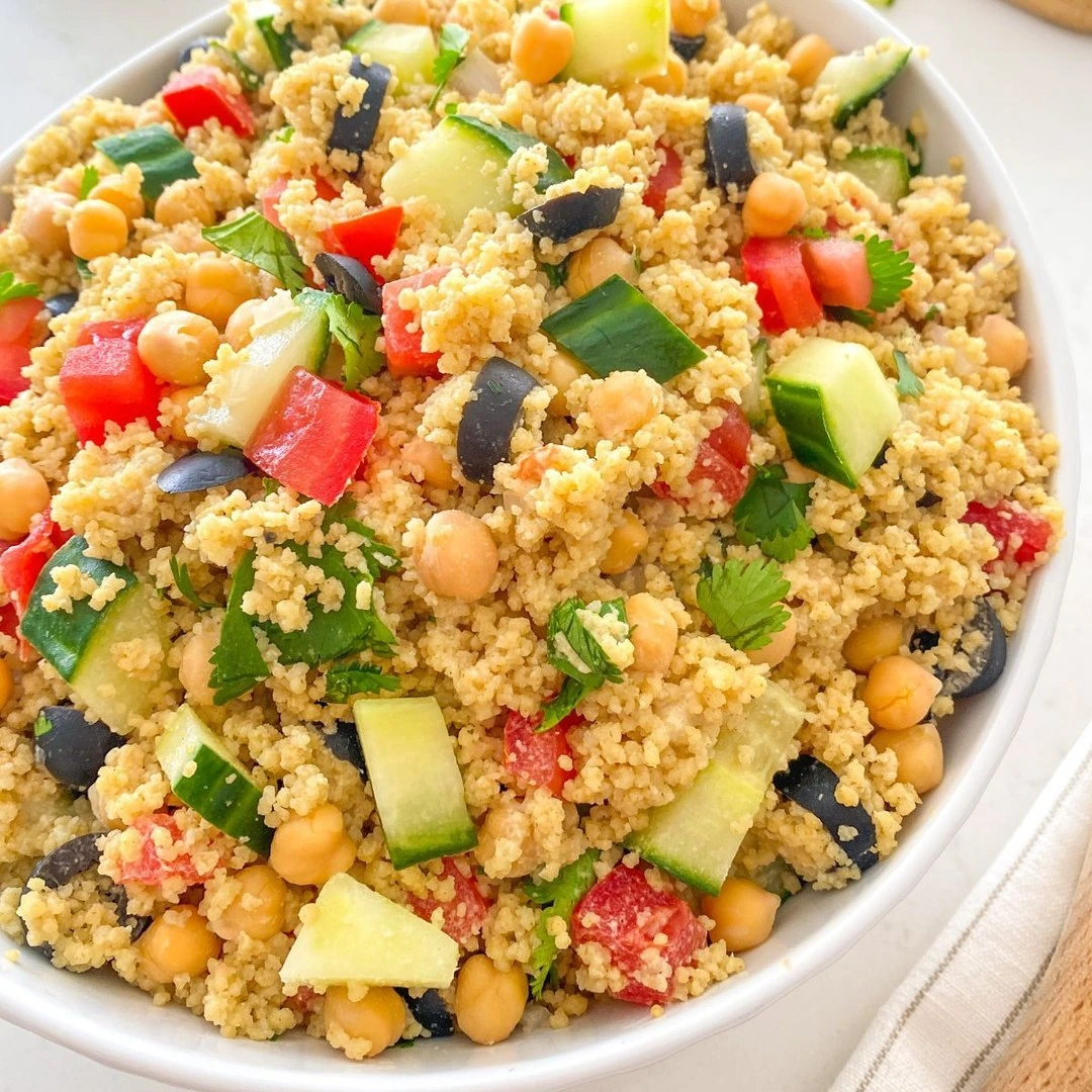 Couscous with chickpeas and chopped vegetables
