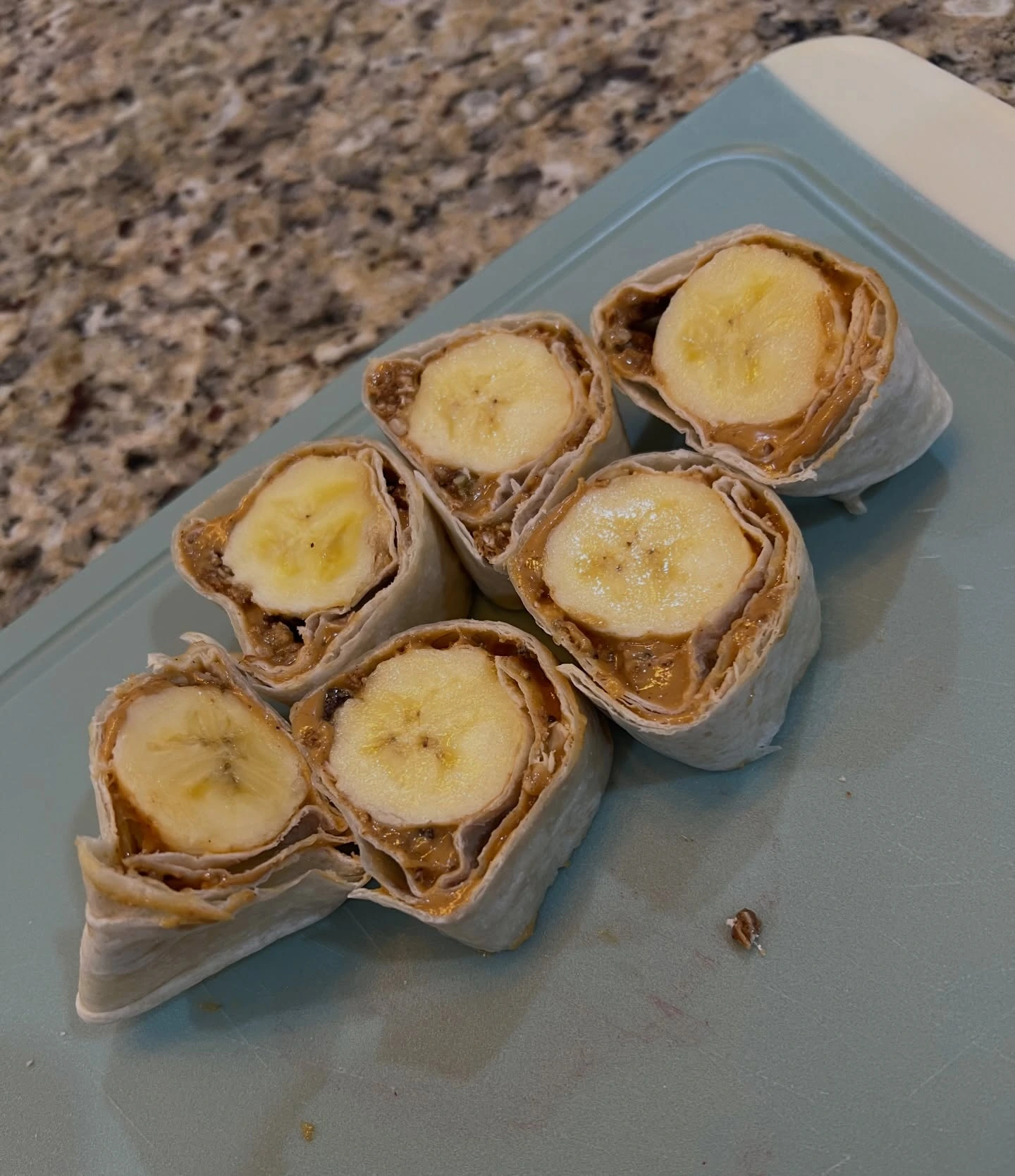 Peanut butter and banana tortilla roll-ups cut into bite-sized pieces
