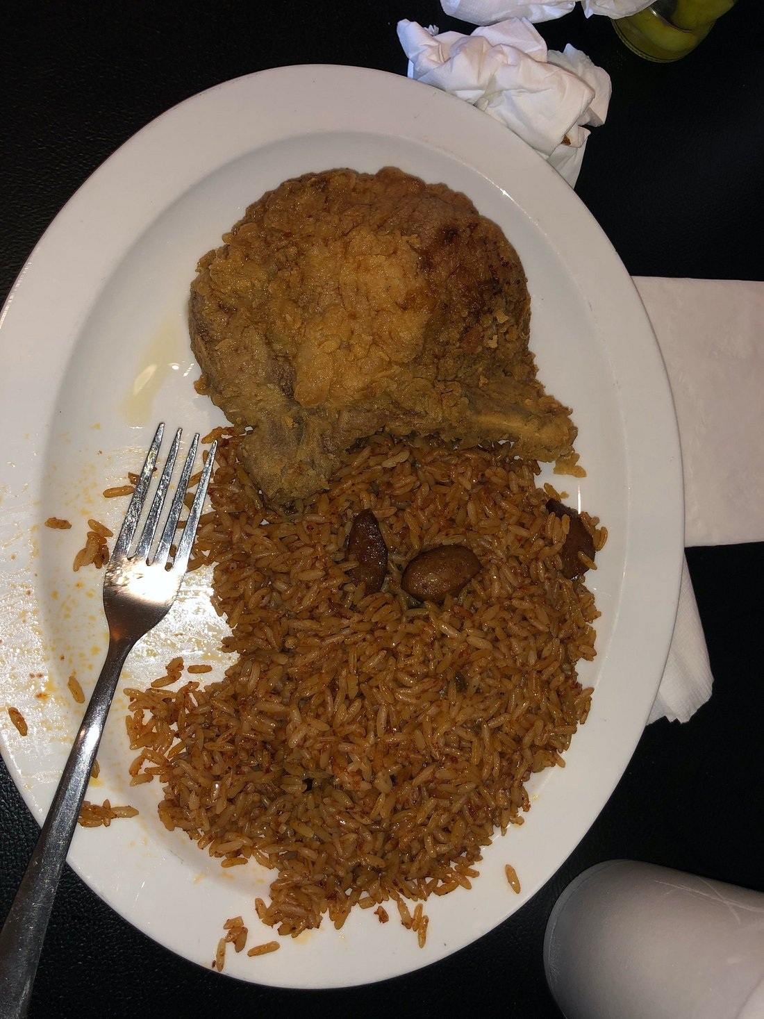 Fried pork chop with red rice at Hannibal’s Kitchen