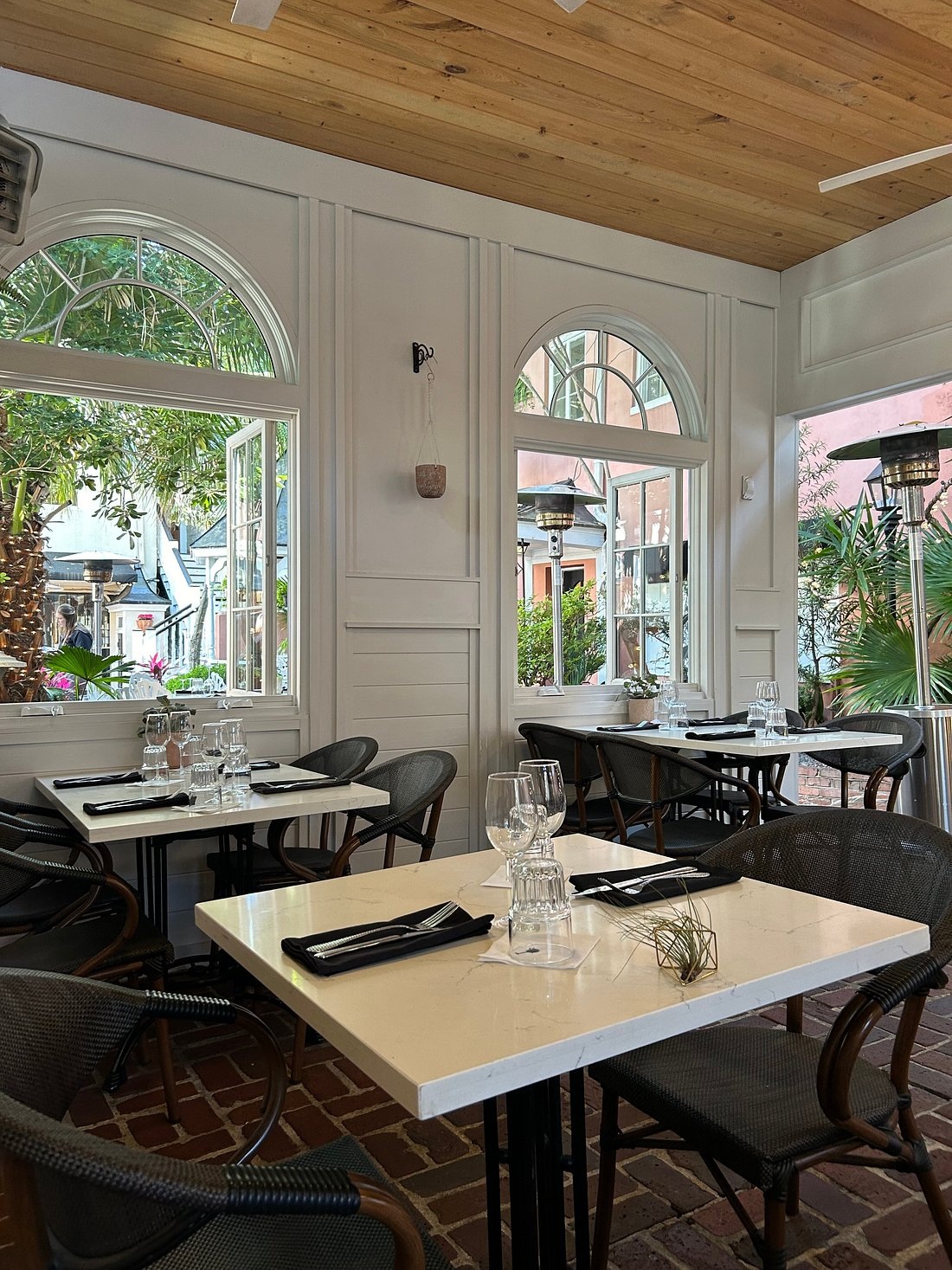 The courtyard dining area at 82 Queen