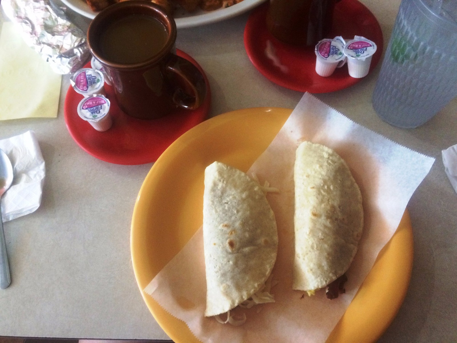 Breakfast tacos with coffee at Taqueria Datapoint