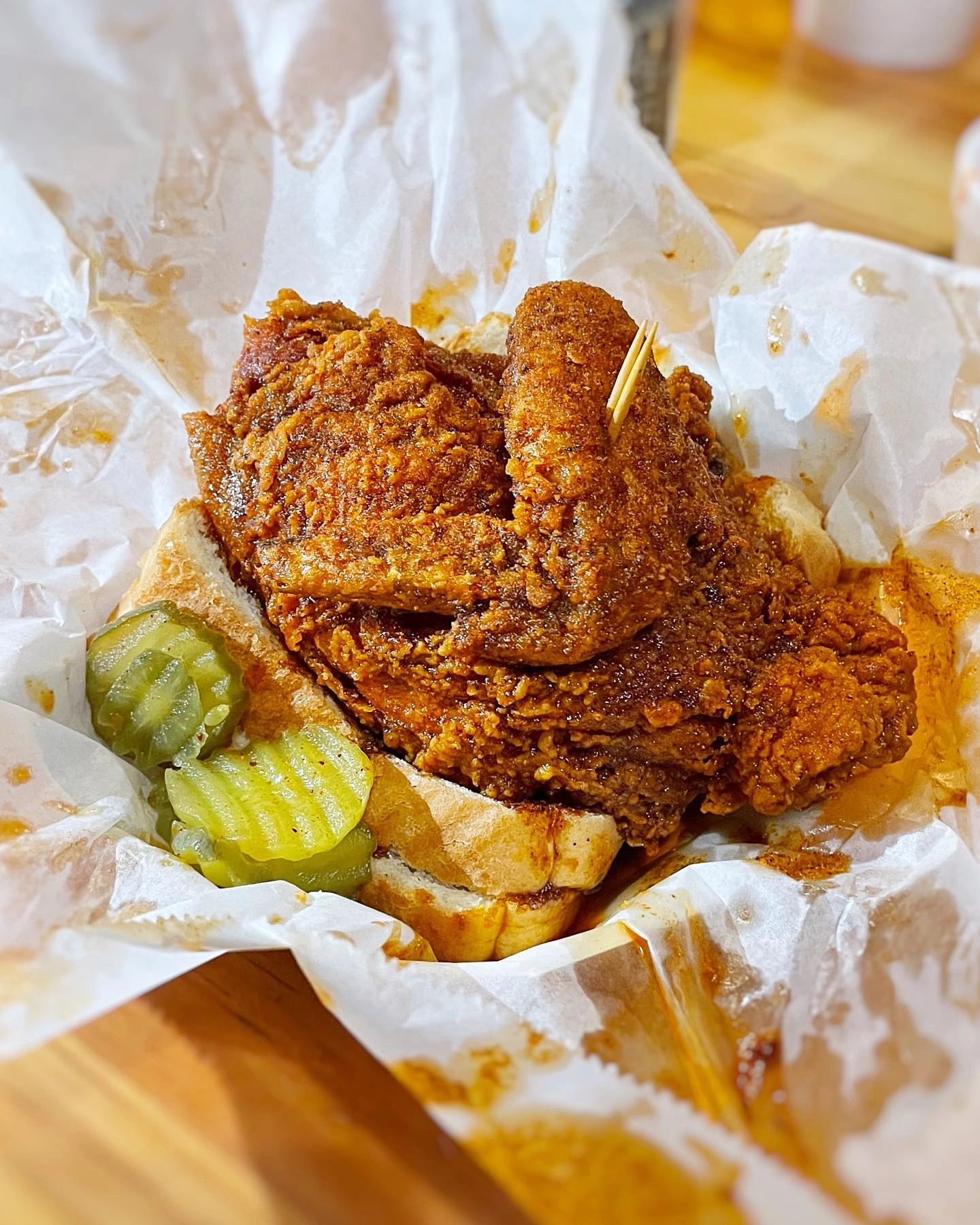 Hot chicken with pickles and white bread at Prince’s Hot Chicken South in Nashville