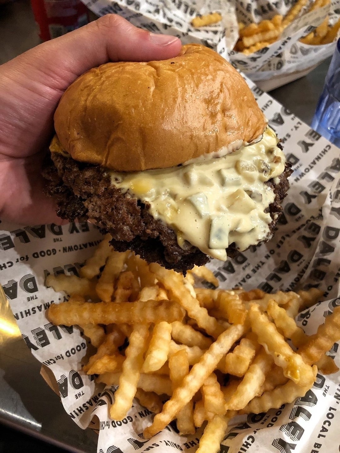 The Daley’s smash burger with crinkle-cut fries at its Waikīkī truck