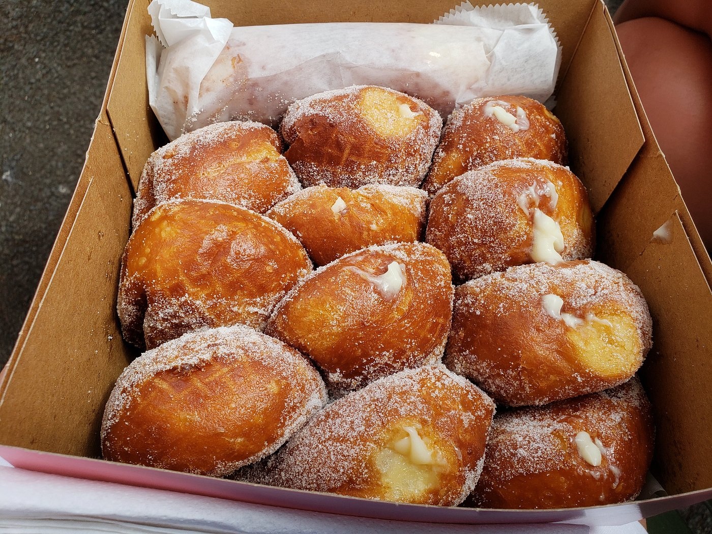 A box of sugar-coated Leonard’s malasadas from the Waikele truck