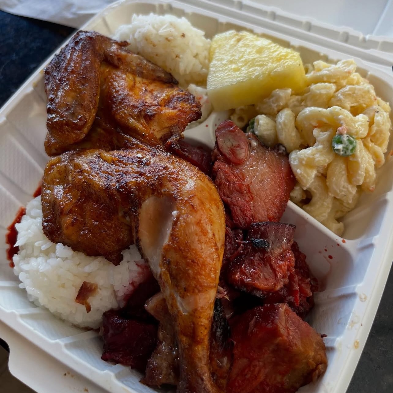 Mike’s Huli Chicken combination plate with rice, macaroni salad and pineapple