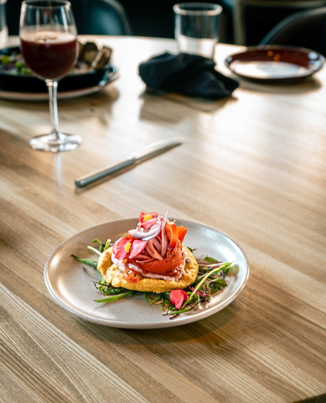 A plated brunch dish at Indígena by Owamni