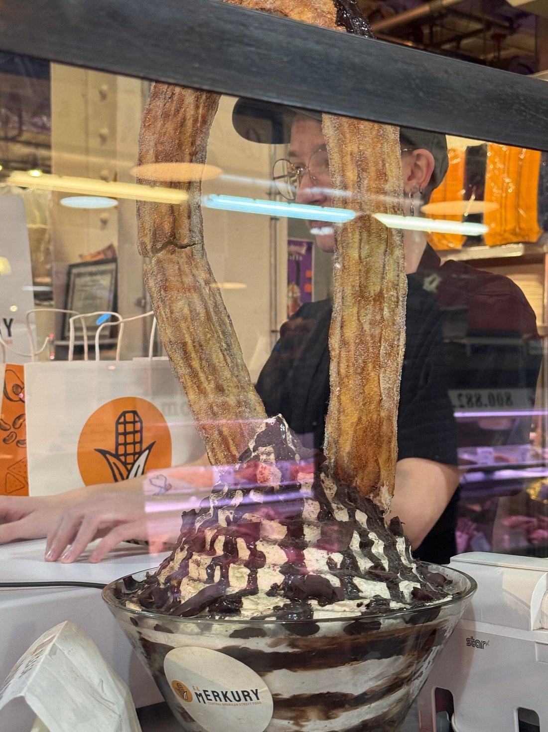 Churros with soft serve at El Merkury’s Reading Terminal Market counter