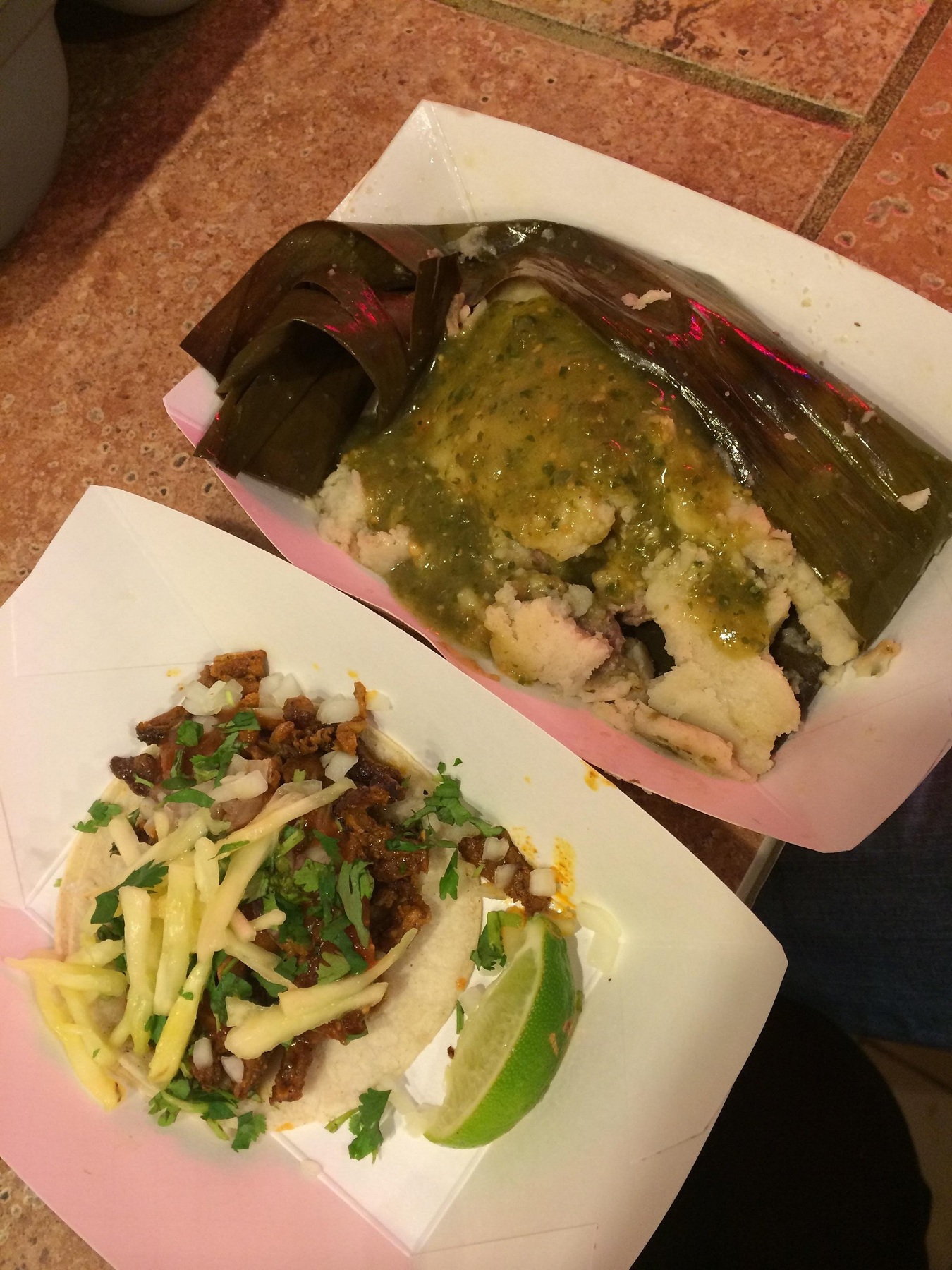 An al pastor taco and pork tamale at Los Agaves at Pike