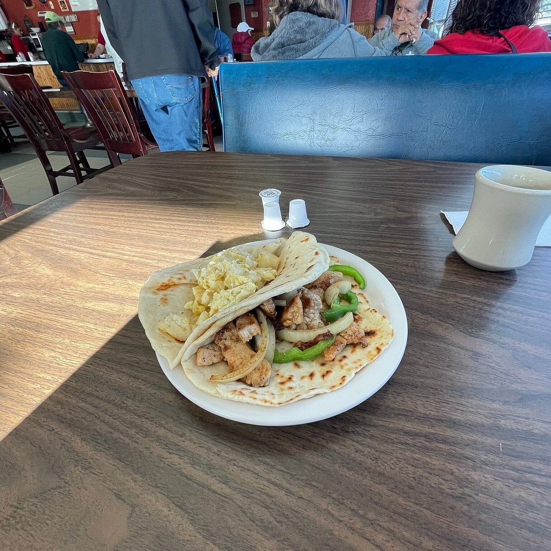 Tacos and coffee in a booth at Thousand Oaks Cafe
