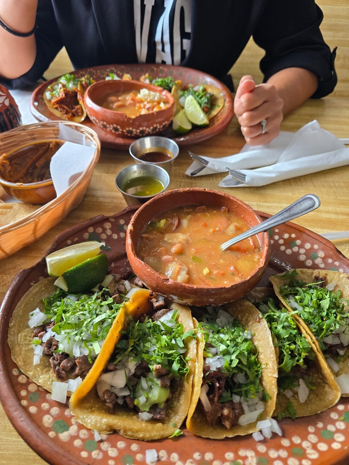 A taco plate with beans and salsa at Tlahco Mexican Kitchen