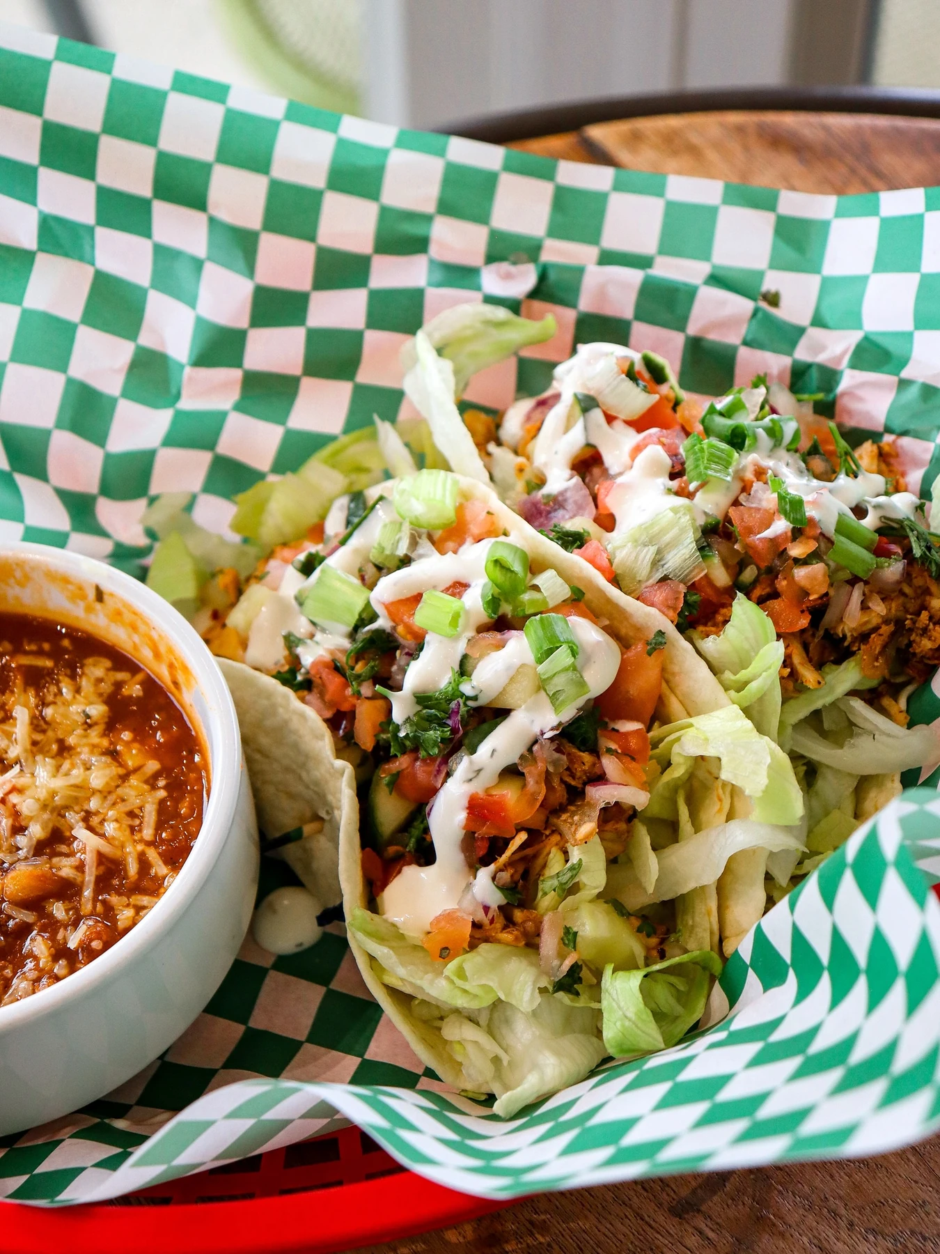 Braised chicken tacos with lettuce, pico de gallo and jalapeño cream