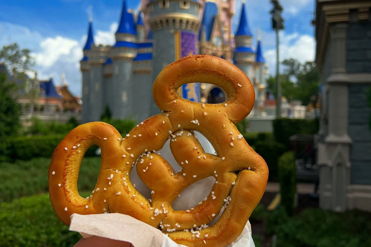 Mickey-shaped pretzel in front of Cinderella Castle at Walt Disney World