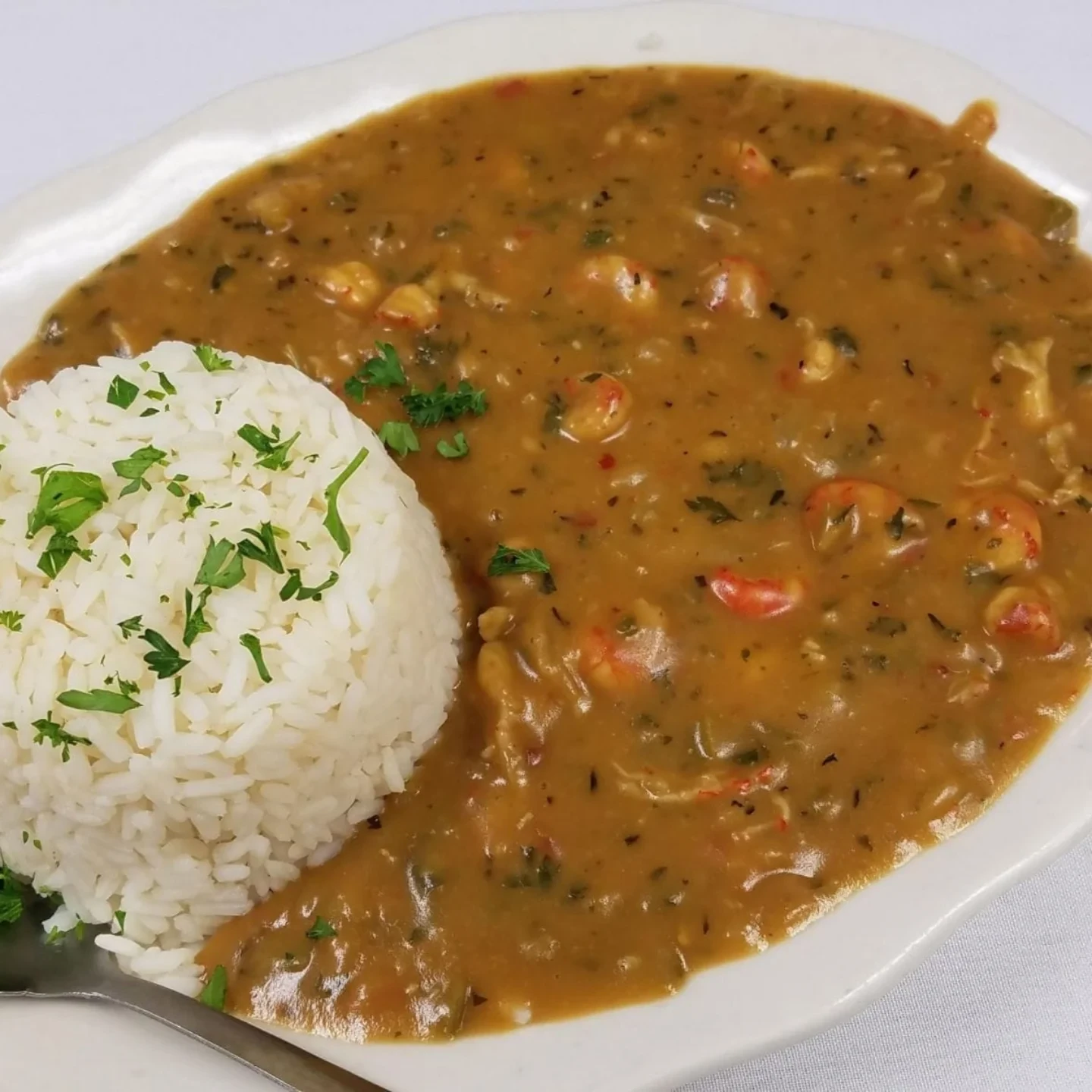 Crawfish étouffée served with white rice at Mandina’s