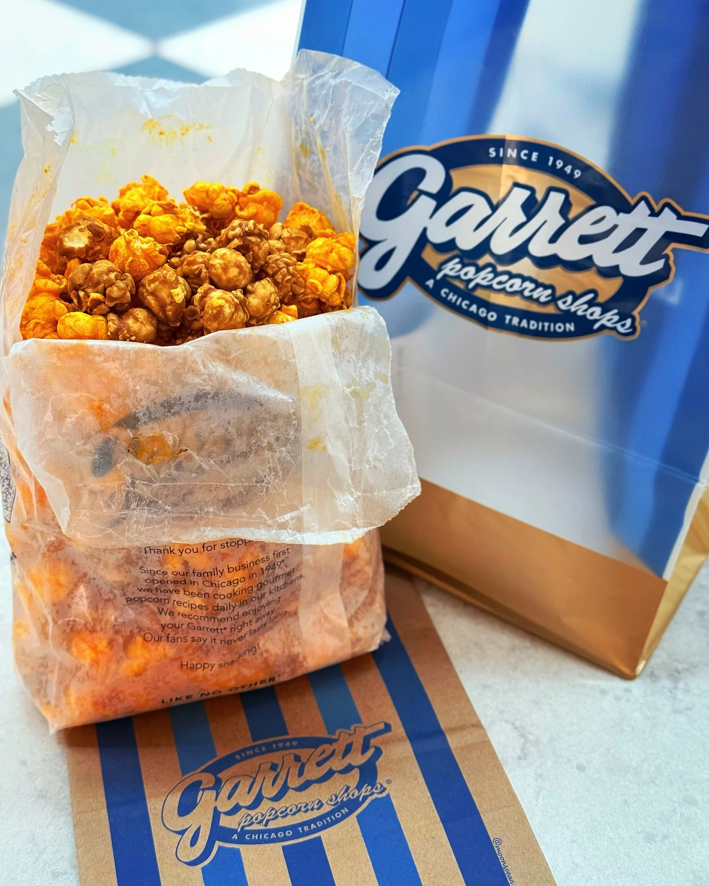 Open bag of Garrett Mix caramel and cheese popcorn