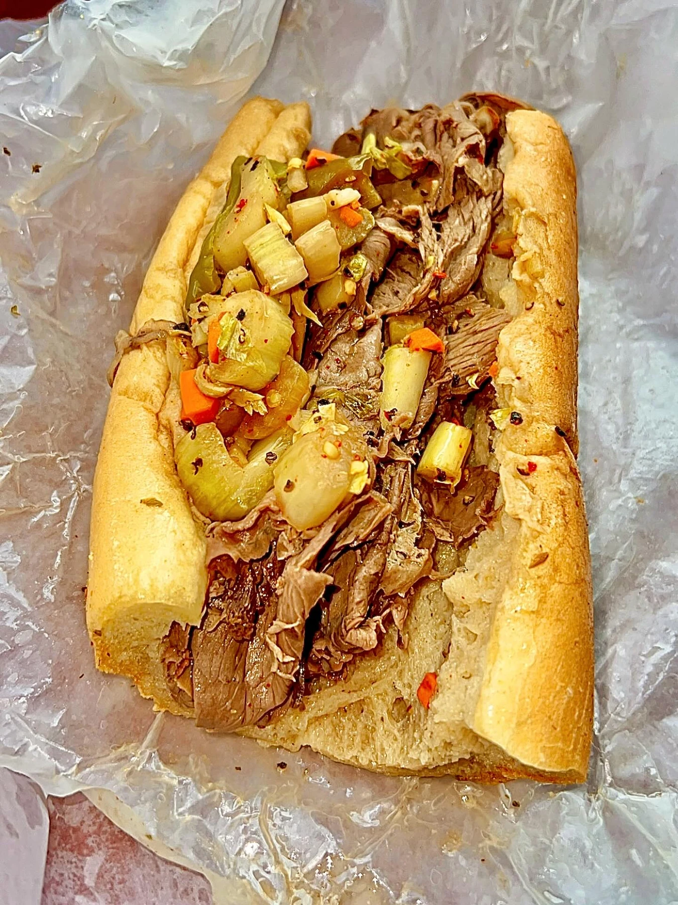 Italian beef sandwich with giardiniera at Mr. Beef in Chicago