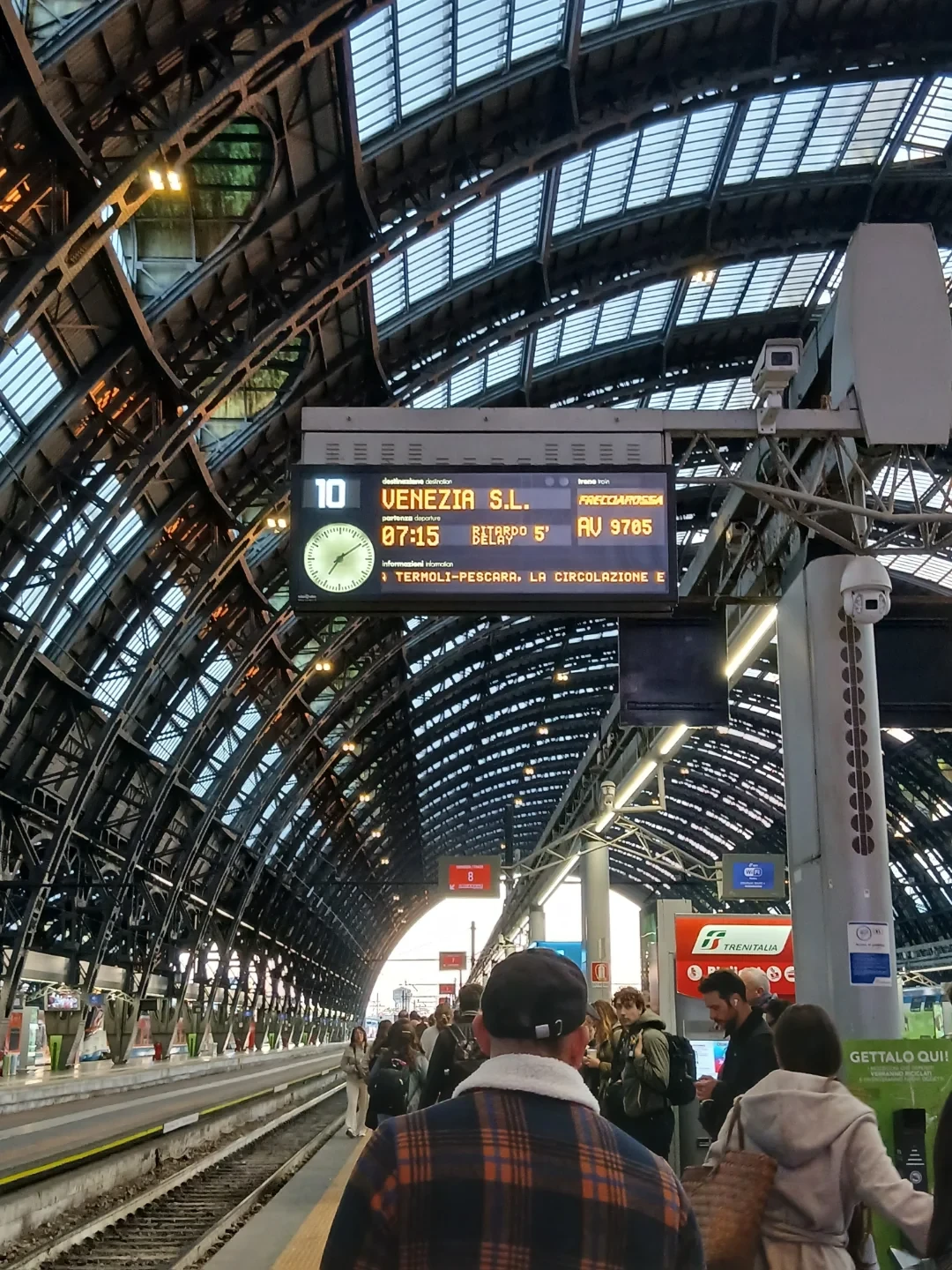Departure board for a Frecciarossa train to Venezia Santa Lucia at Milan station