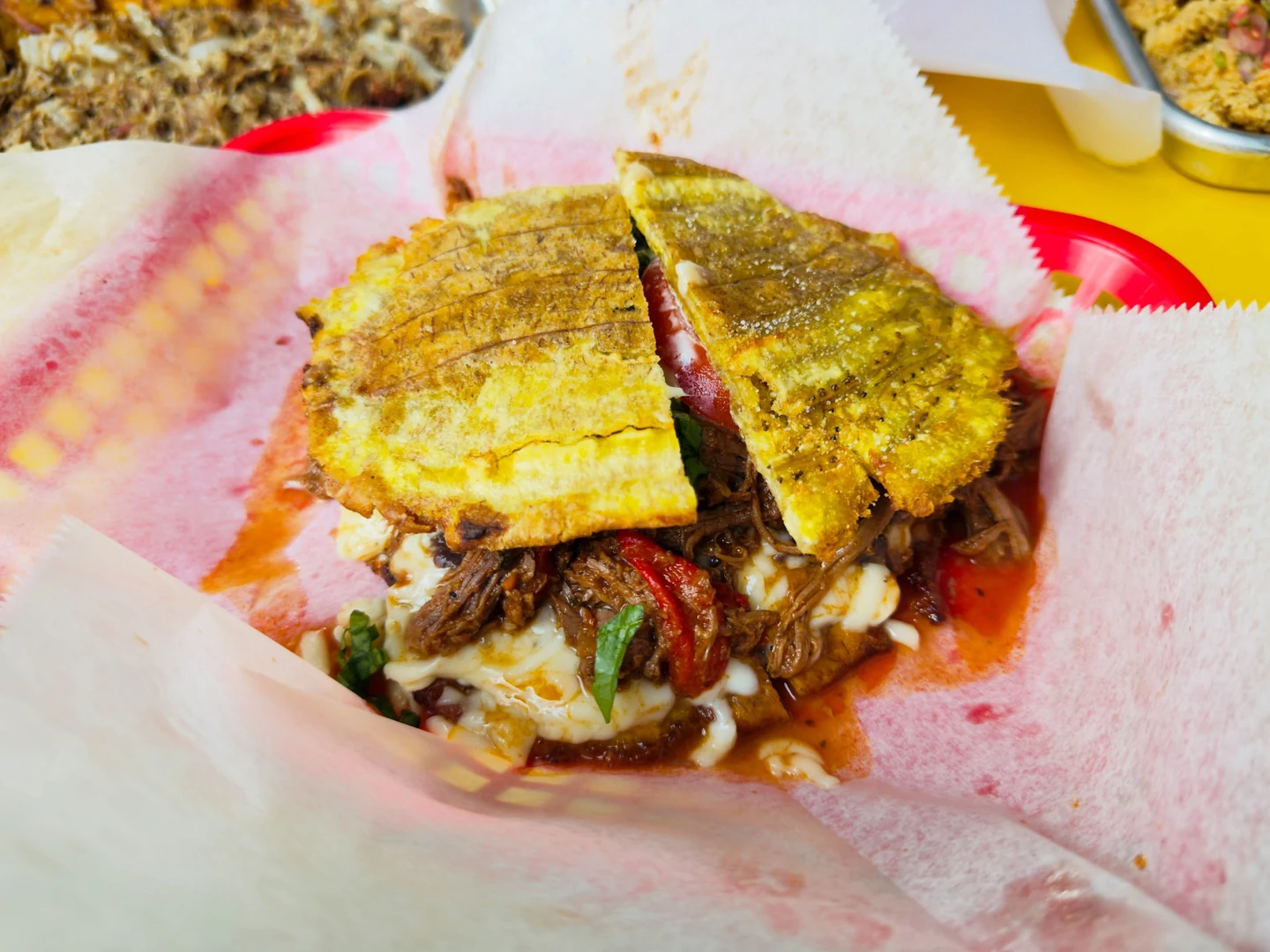 Beef-filled jibarito with crisp plantains at Omarcito’s Latin Café