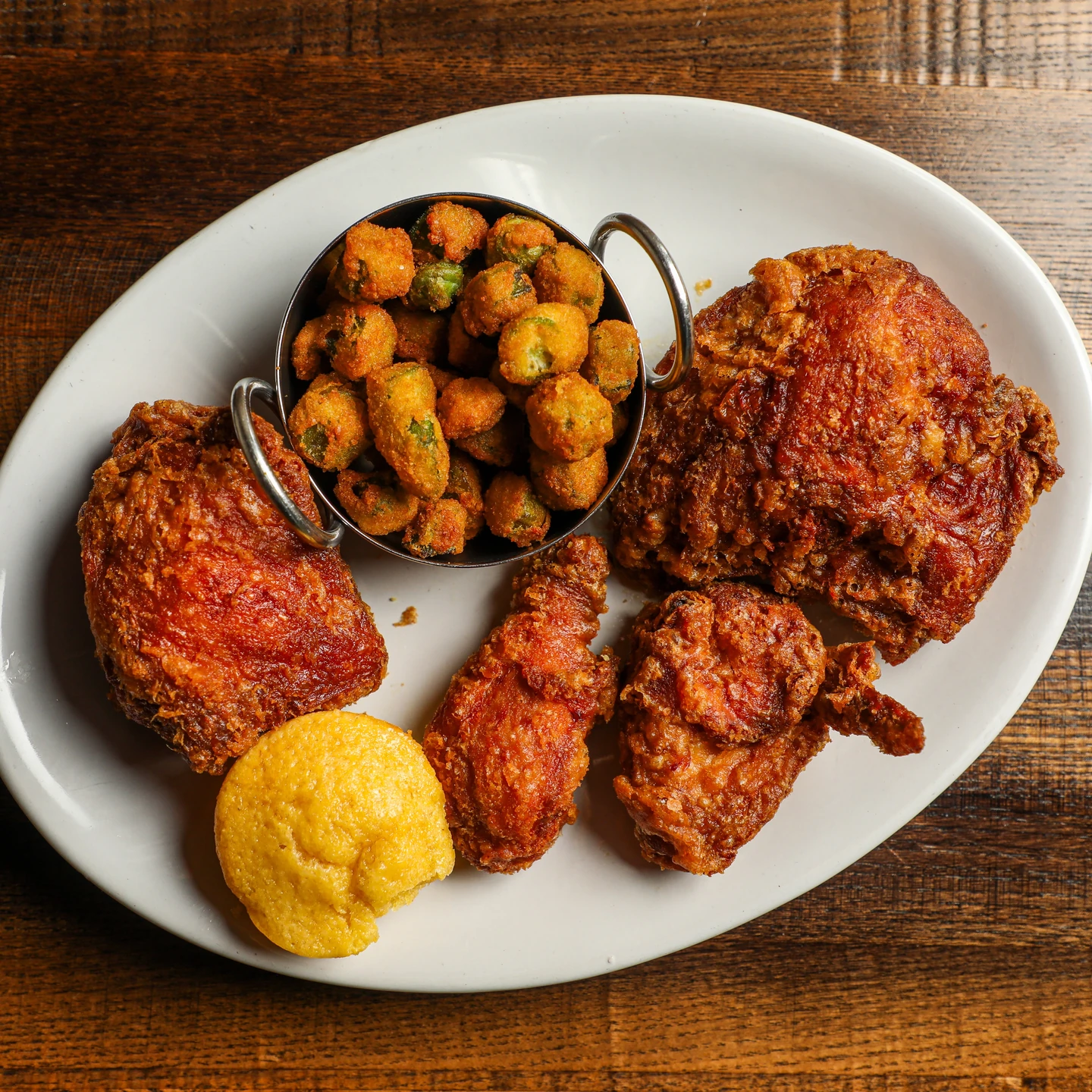 Fried chicken with fried okra and a corn muffin at Willie Mae’s