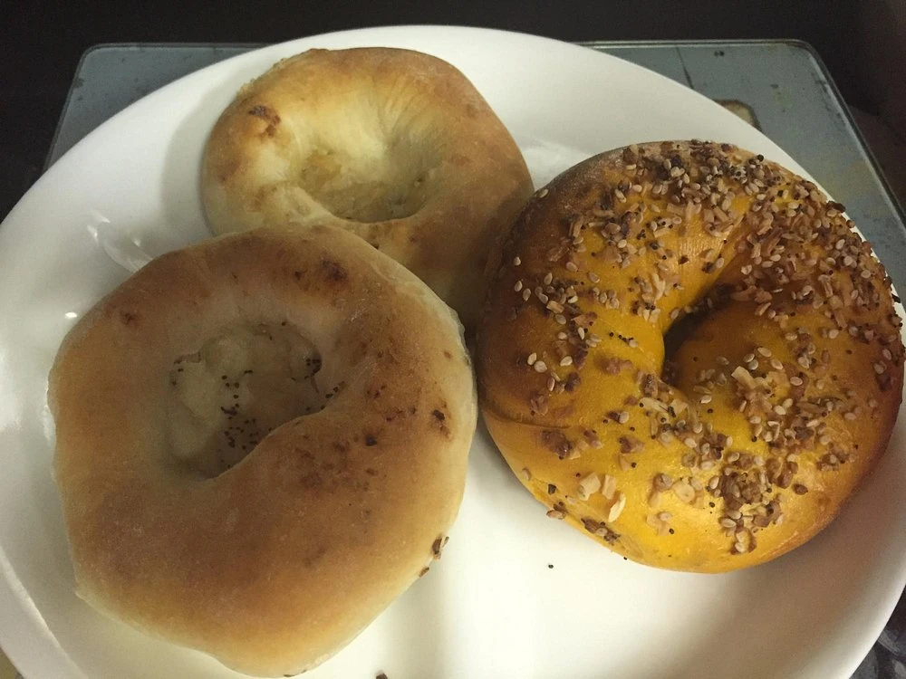 Onion bialys and an everything egg bagel at Kossar’s