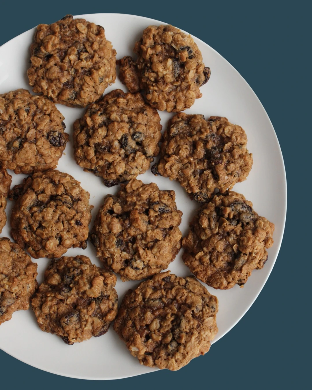 Oatmeal raisin cookies on a white plate