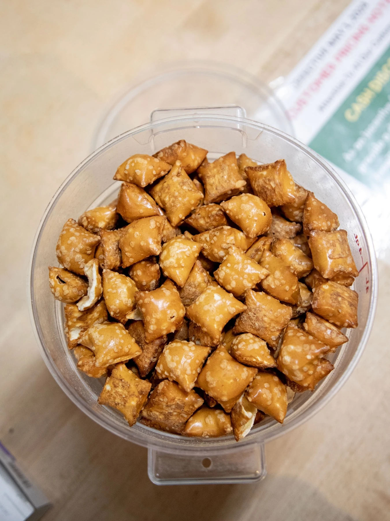 Peanut butter filled pretzel nuggets in a tub