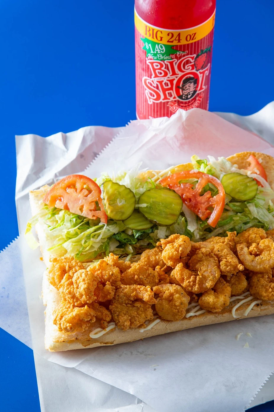 Fried shrimp po’boy with lettuce, tomatoes, and pickles at Melba’s in New Orleans