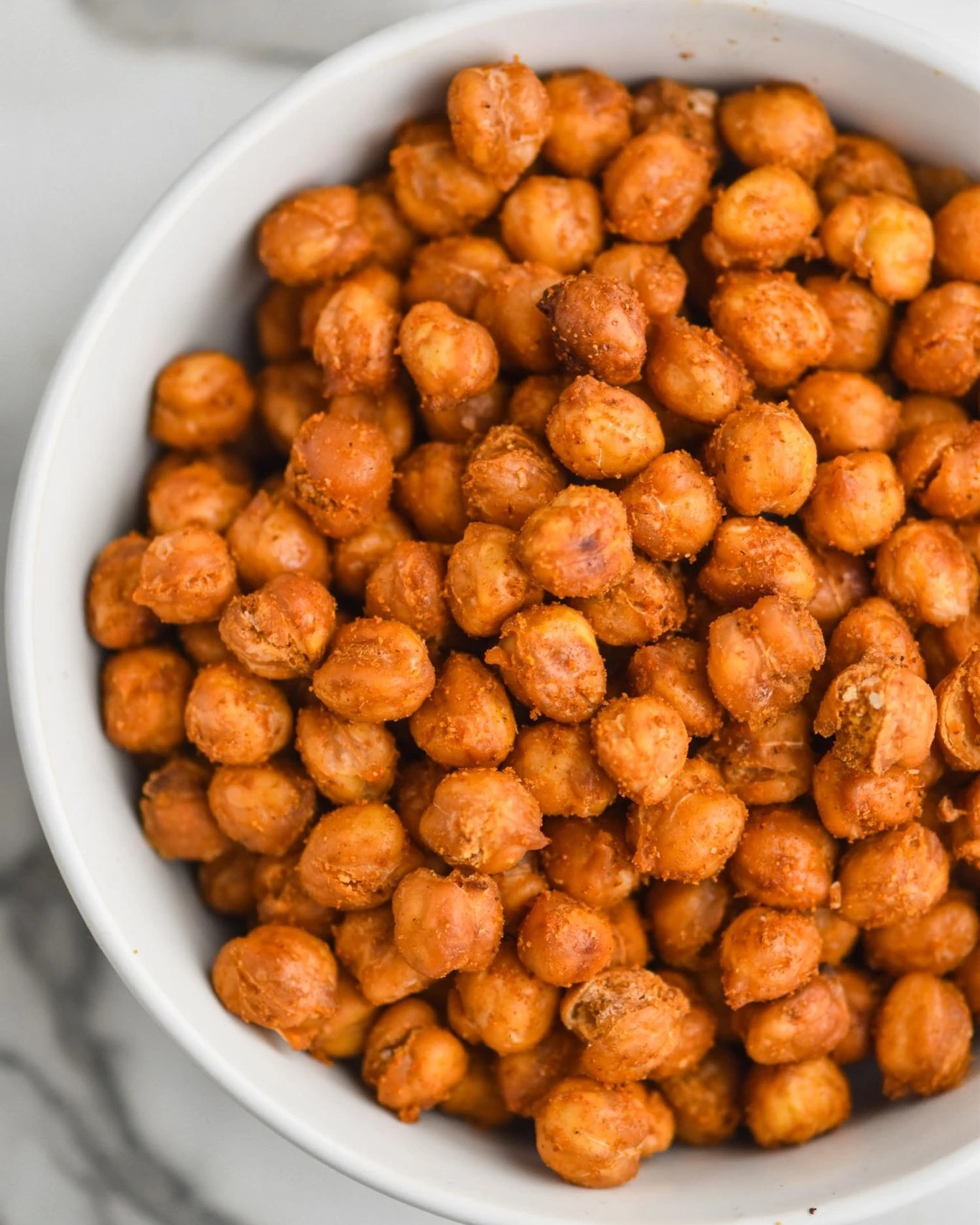 Crisp roasted chickpeas in a white bowl