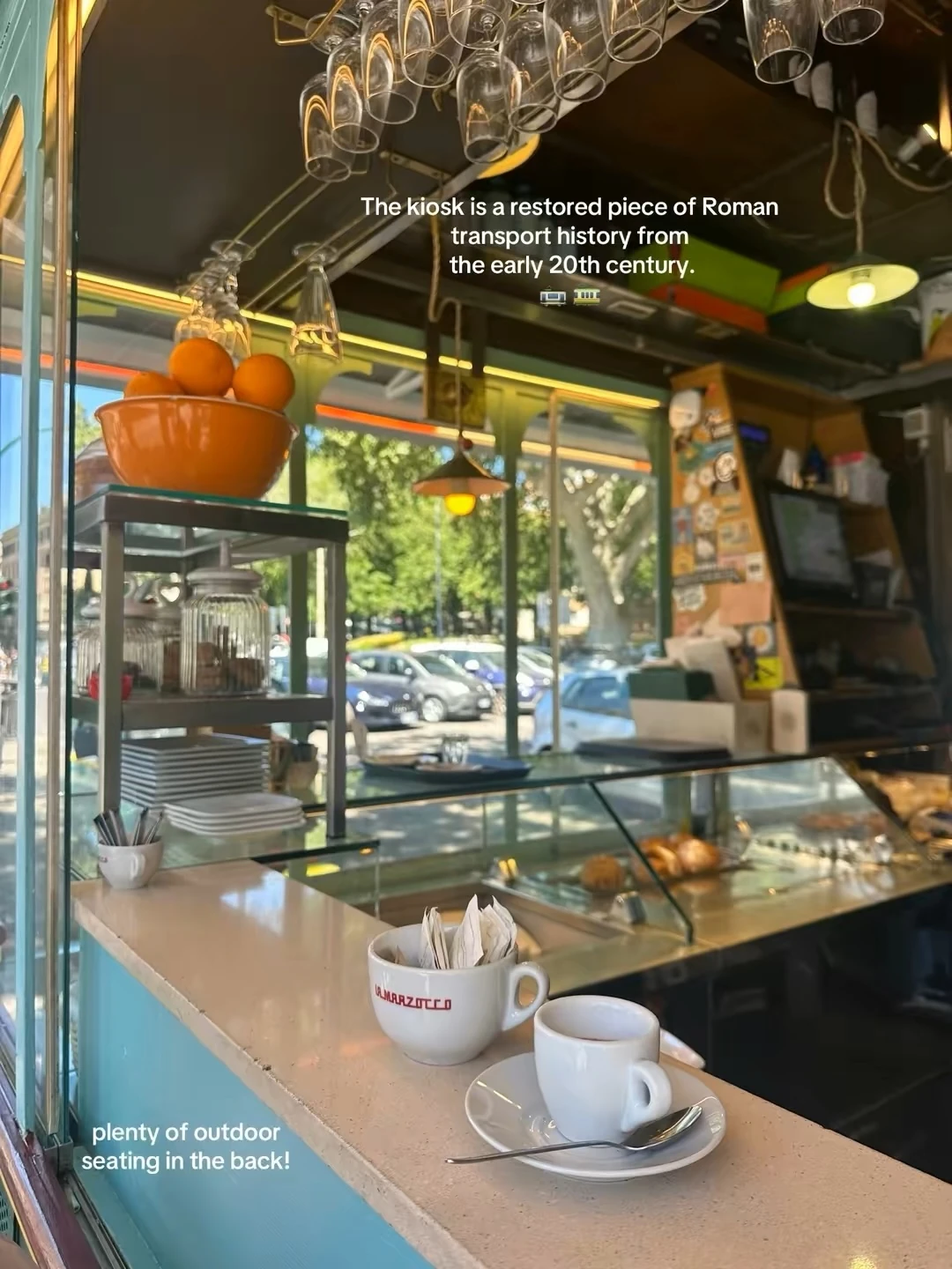 Coffee and pastry counter inside a converted-tram café in Testaccio, Rome