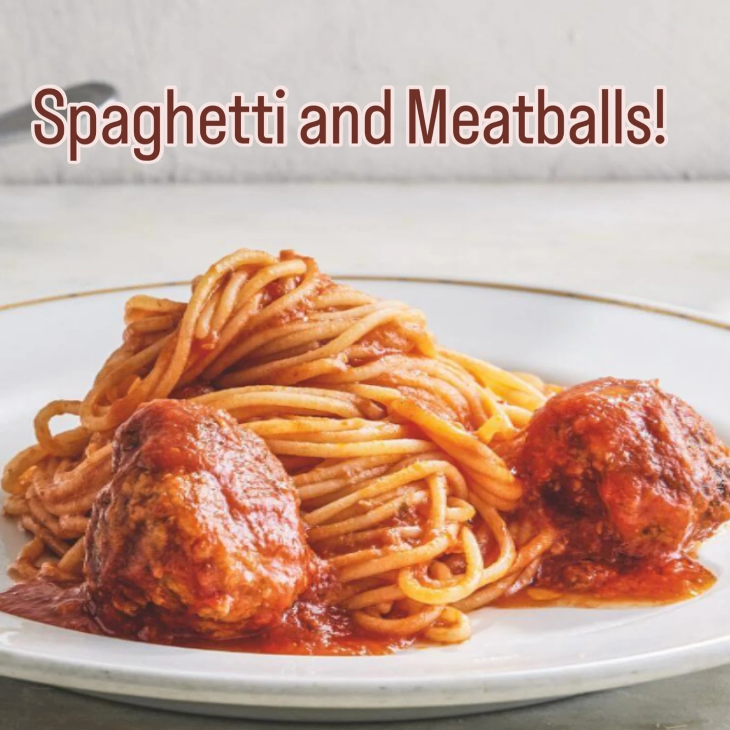 Spaghetti and meatballs in tomato sauce
