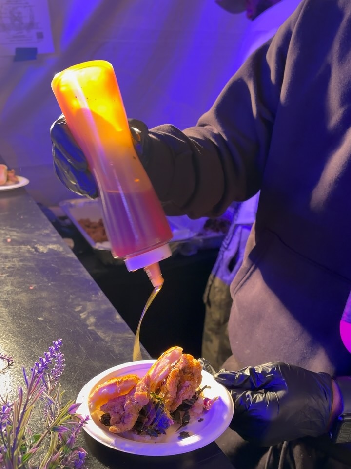 A dish being finished at The Cookout during NYCWFF