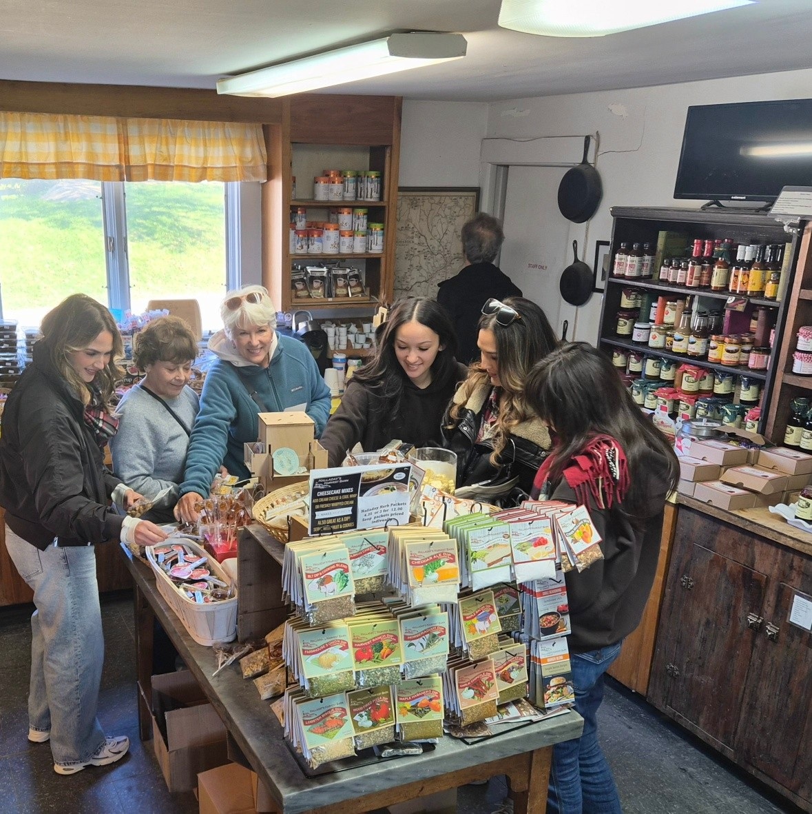 Visitors sampling cheese at Sugarbush Farm