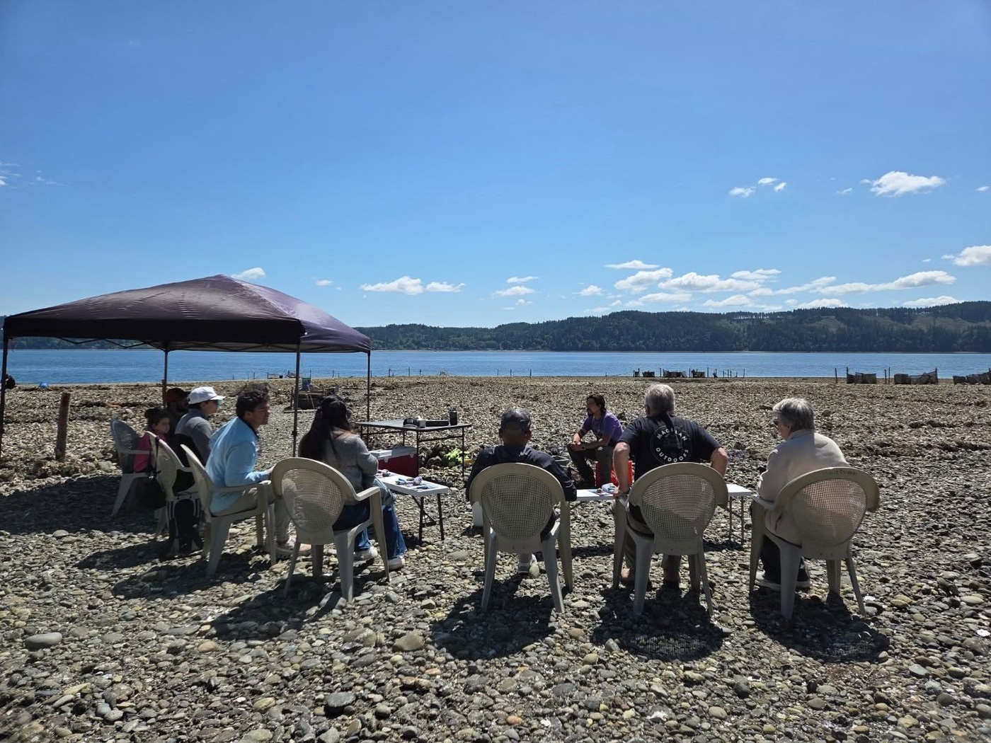 An oyster class on the shore at Olympic Oyster Co.